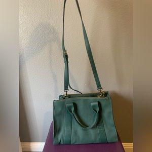 Olive green, over the shoulder/hand held purse/bag.
